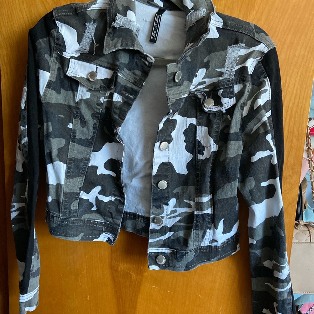 Camo Jean jacket with rips.